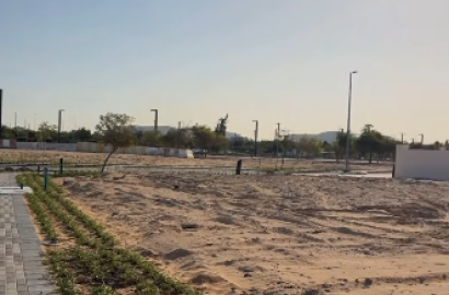 Corner residential land in Khalifa City, Al Merief project